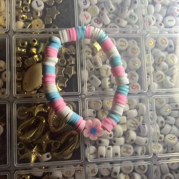 This is a flower clay bead bracelet - Picture 1 of 1